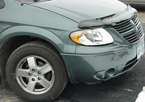 After photo of a teal van with repaired front-end collision damage performed by Wayne's Auto Body in Le Center, MN